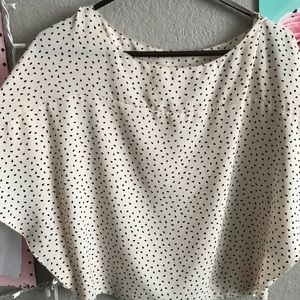 This cream shirt with an little heart on it